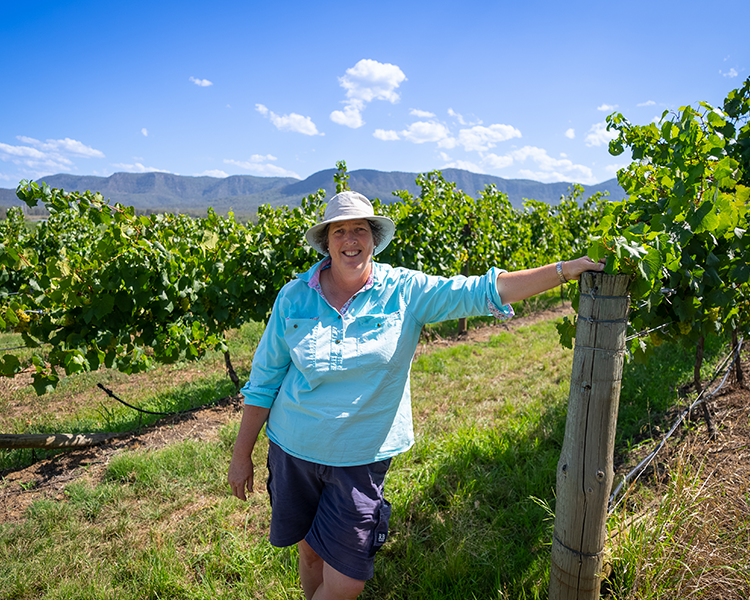 Viticulturalist, Liz Riley, standing in the vineyard at Scarborough Wine Co