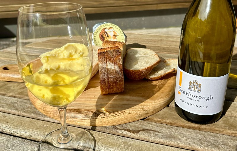 Glass of Scarborough Chardonnay with plate of bread